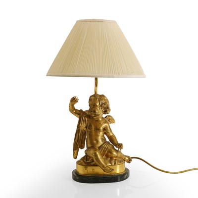 Lot 320 - A gilt-brass putto lamp