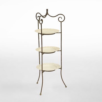 Lot 468 - A wrought iron three-tiered cake stand