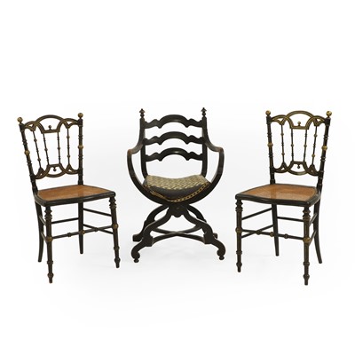 Lot 414 - An ebonised X-frame chair