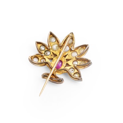 Lot 12 - An antique pink sapphire and split pearl stick pin