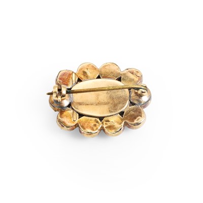 Lot 5 - A Georgian amethyst and split pearl mourning brooch