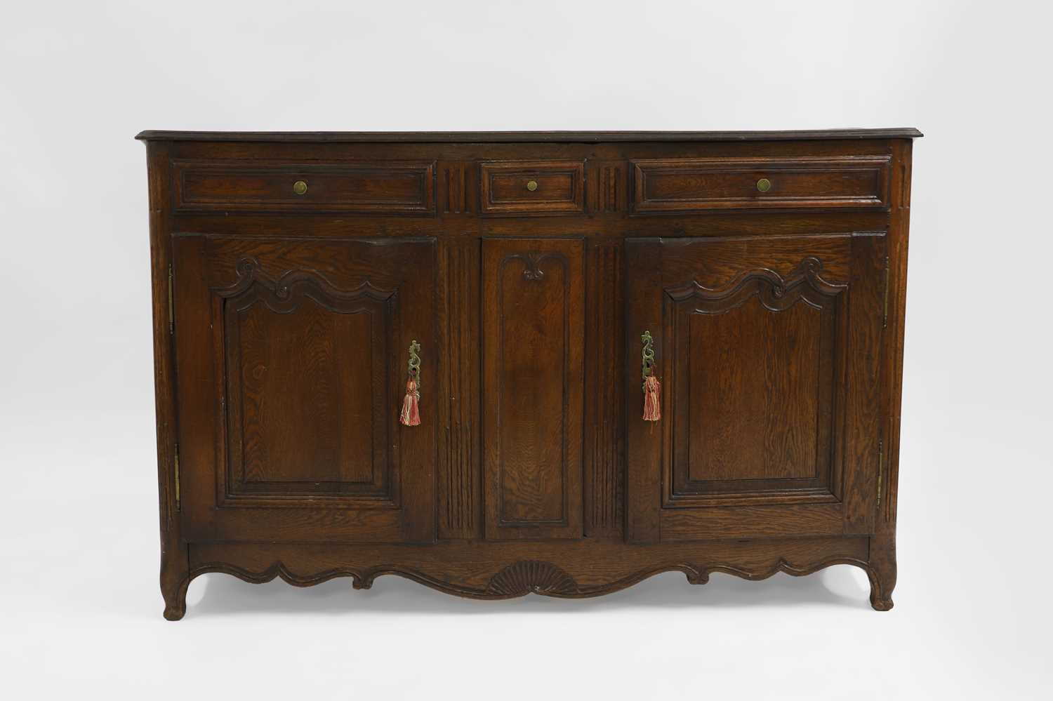 Lot 420 - A French provincial oak buffet