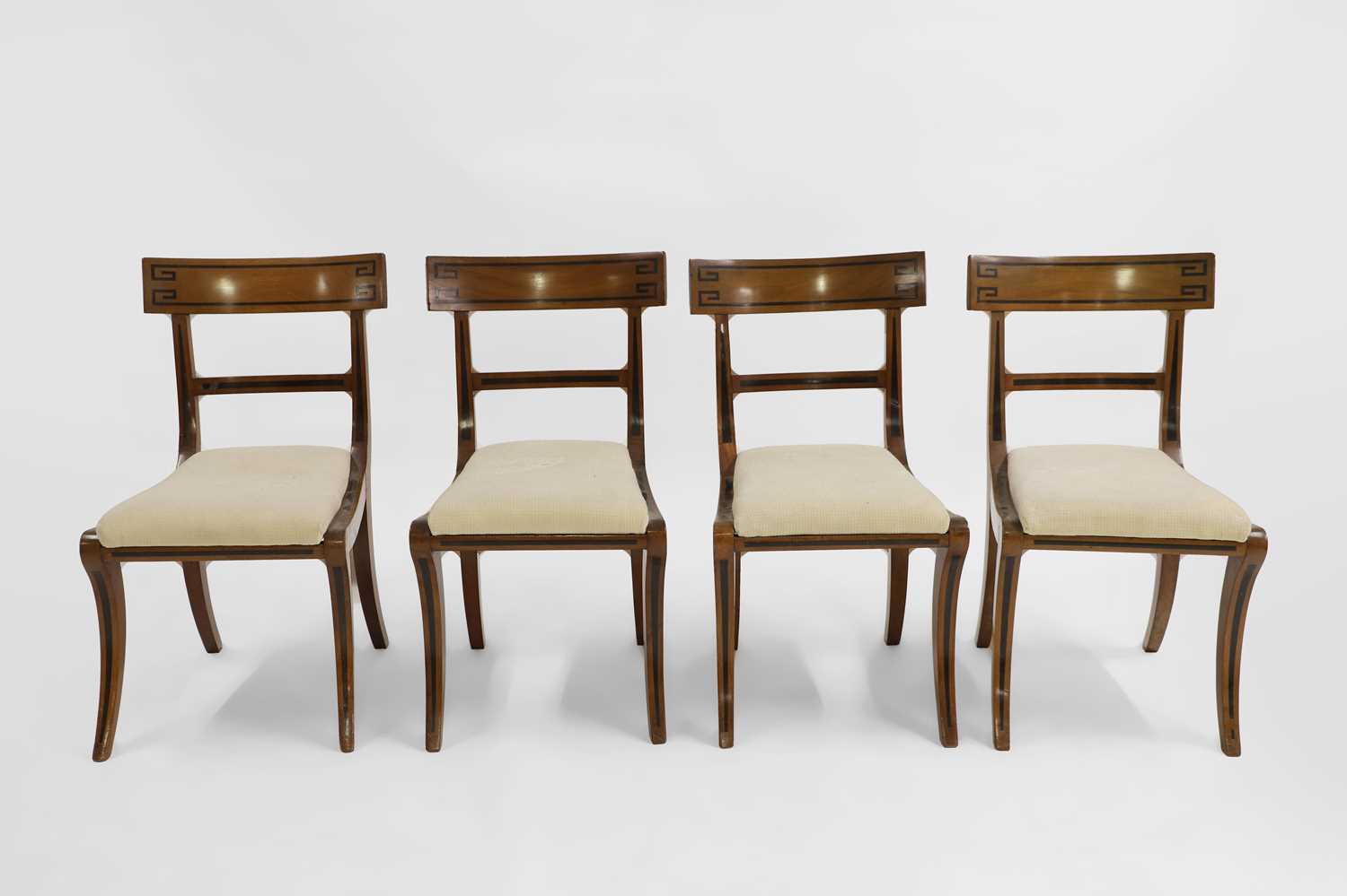 Lot 431 - A set of four Regency mahogany/satinwood and ebonised line inlaid dining chairs