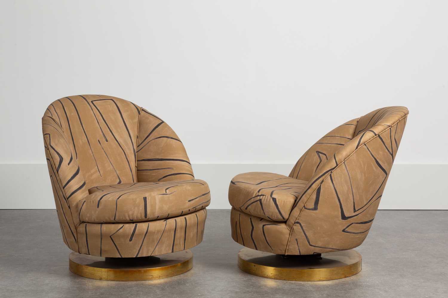 Lot 9 - A pair of upholstered tub chairs