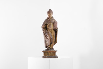 Lot 259 - A carved, painted and parcel-gilt figure of St Cyprian