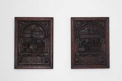 Lot 148 - A pair of carved oak furniture panels