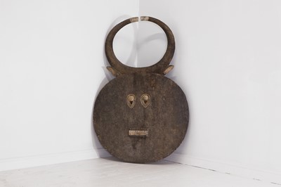 Lot A large Baule carved and painted wooden Kple-kple mask