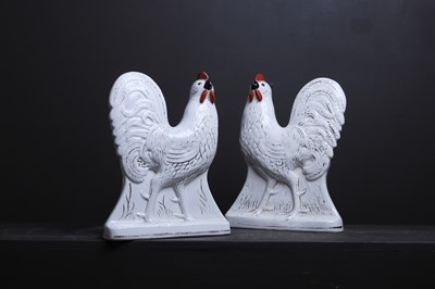 Lot 515 - A pair of pottery chickens