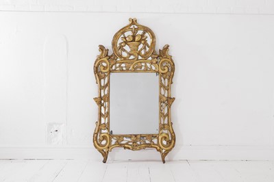 Lot 423 - A carved giltwood marriage mirror