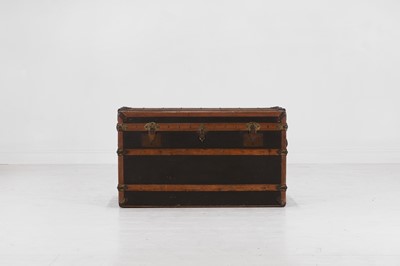 Lot 473 - A beech, leather and brass steamer travel trunk by Hall du Voyage of Paris