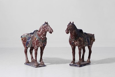 Lot 245 - A pair of carved and painted wooden horses