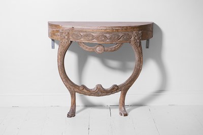Lot 266 - A small carved stripped pine console table