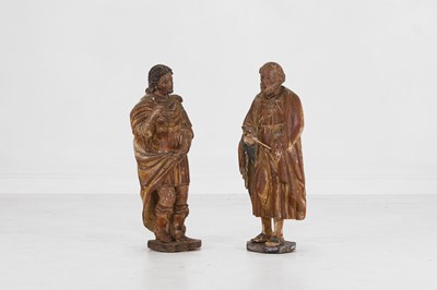 Lot 524 - A pair of carved, painted and parcel-gilt wooden figures of saints