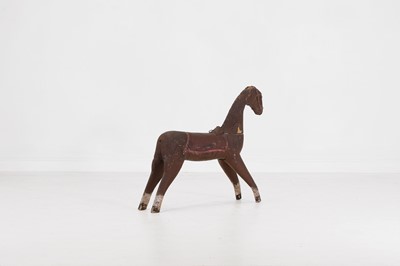 Lot 162 - A primitive painted wooden horse