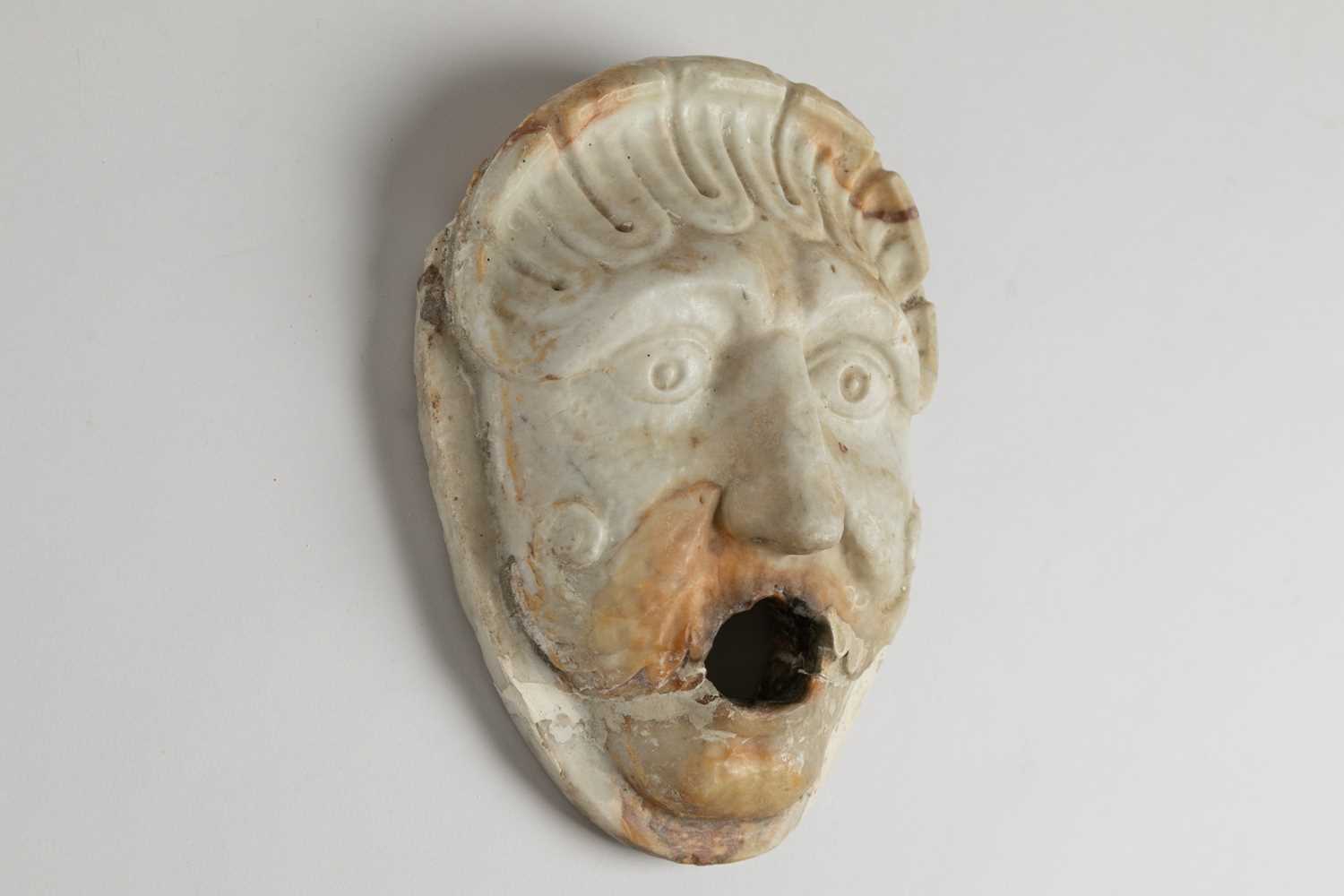 Lot 165 - A marble fountain mask or gargoyle