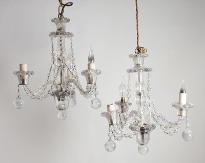 Lot 336 - A pair of cut glass chandeliers