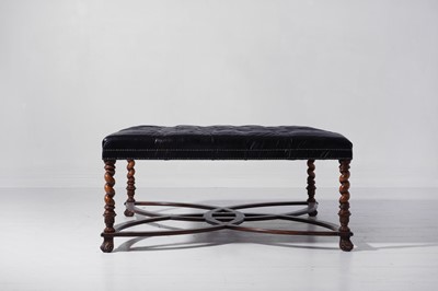 Lot 143 - A large buttoned-leather stool