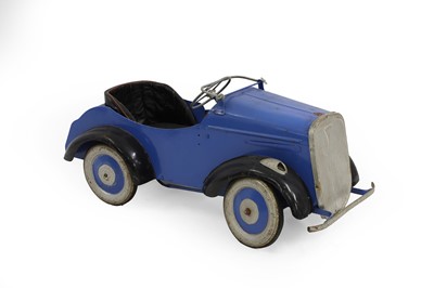 Lot 53 - A child's tinplate pedal car
