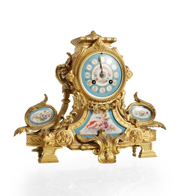 Lot 173 - An ormolu and porcelain mounted mantel clock