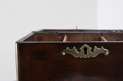 Lot A brass-mounted mahogany tea caddy in the manner of Abraham Roentgen