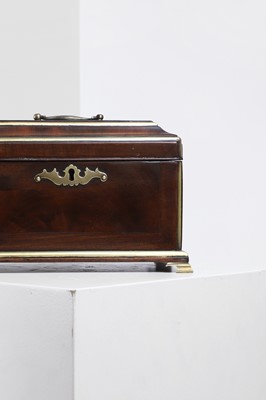 Lot A brass-mounted mahogany tea caddy in the manner of Abraham Roentgen