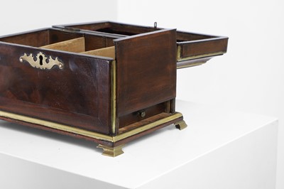 Lot A brass-mounted mahogany tea caddy in the manner of Abraham Roentgen