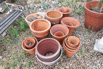 Lot 512 - A collection of terracotta plant pots