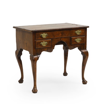 Lot 411 - A walnut lowboy