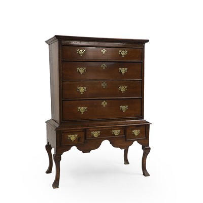 Lot 386 - A George I oak chest on stand