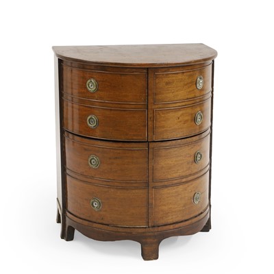 Lot 407 - A mahogany bow front night table