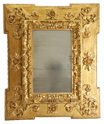 Lot 469 - A carved and gilt wall mirror