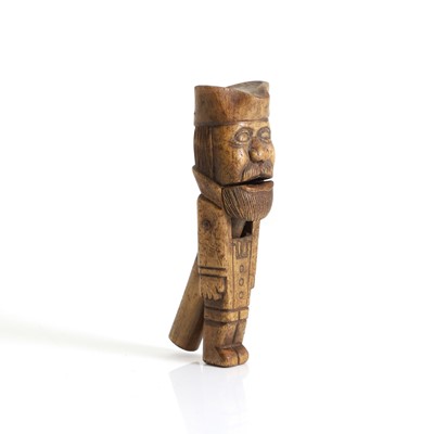 Lot 222 - A pair of Continental treen nut crackers