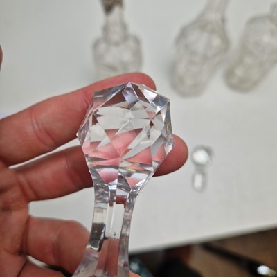 Lot 49 - A set of three silver-mounted cut-glass decanters