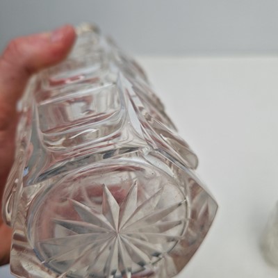 Lot 49 - A set of three silver-mounted cut-glass decanters