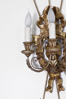 Lot 475 - A pair of gilt-composition three-branch wall lights