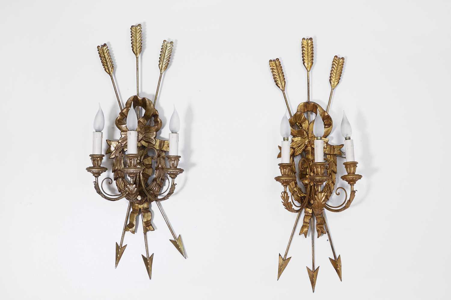 Lot 475 - A pair of gilt-composition three-branch wall lights