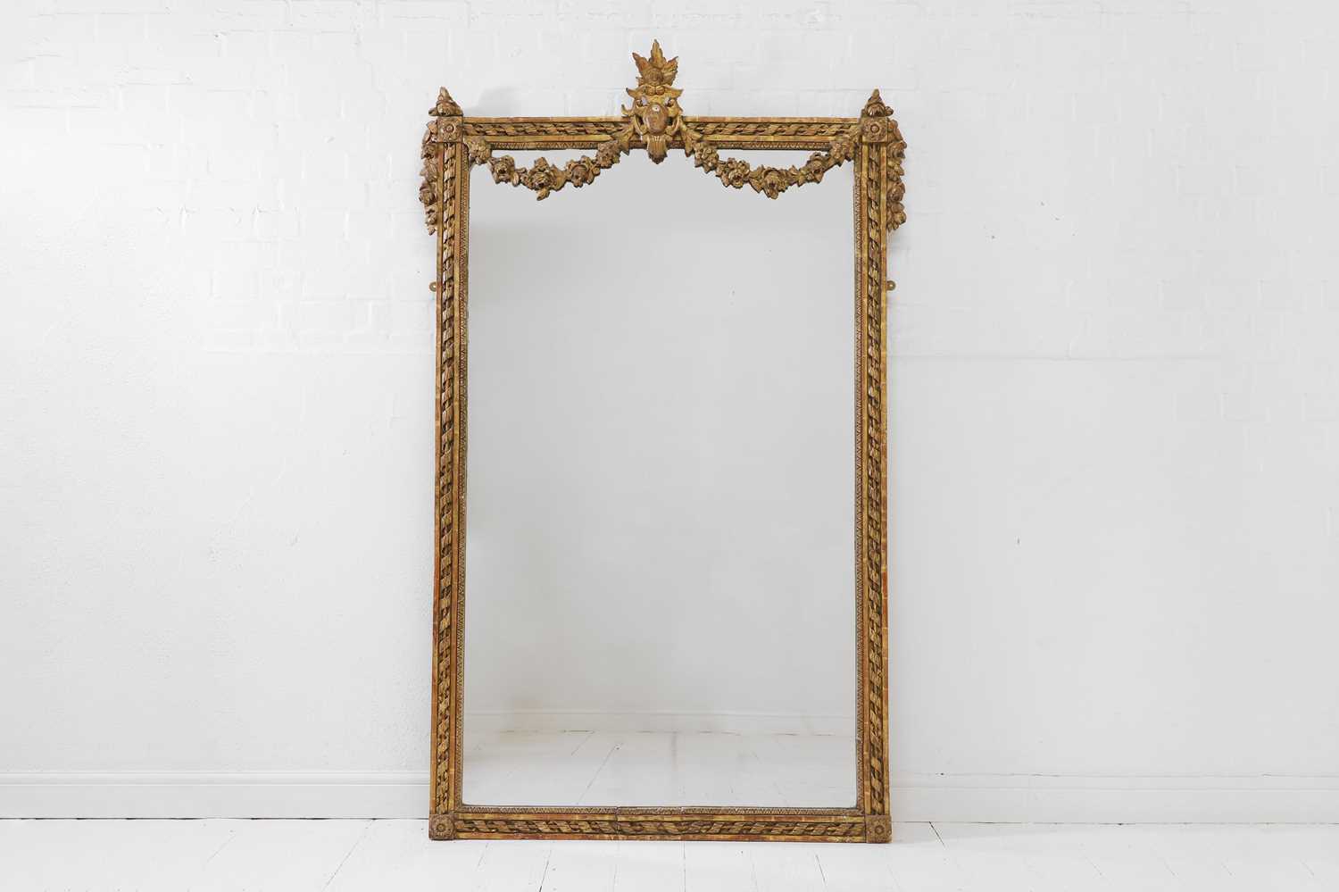 Lot 279 - A Louis XVI-style carved giltwood and gesso mirror