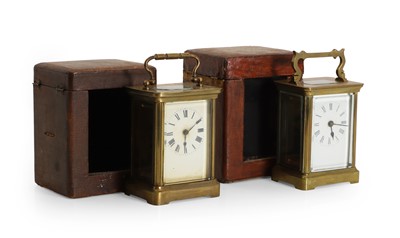 Lot 189 - Three brass cased carriage timepieces, in travelling cases