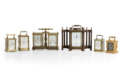 Lot 180 - A modern brass desk clock