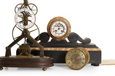 Lot 174 - A brass skeleton clock