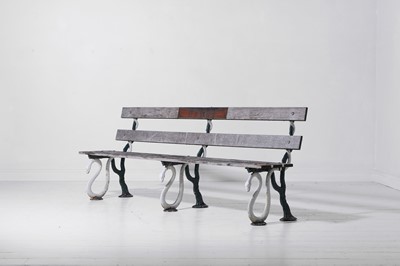 Lot 577 - A painted cast iron garden bench