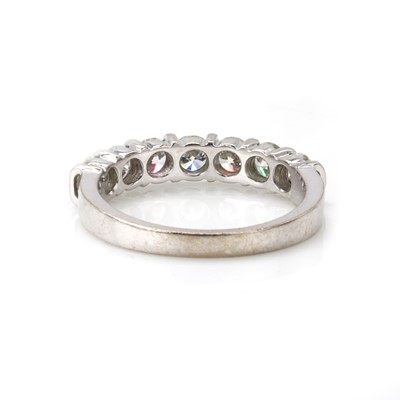 Lot 77 - An 18ct white gold diamond half eternity ring