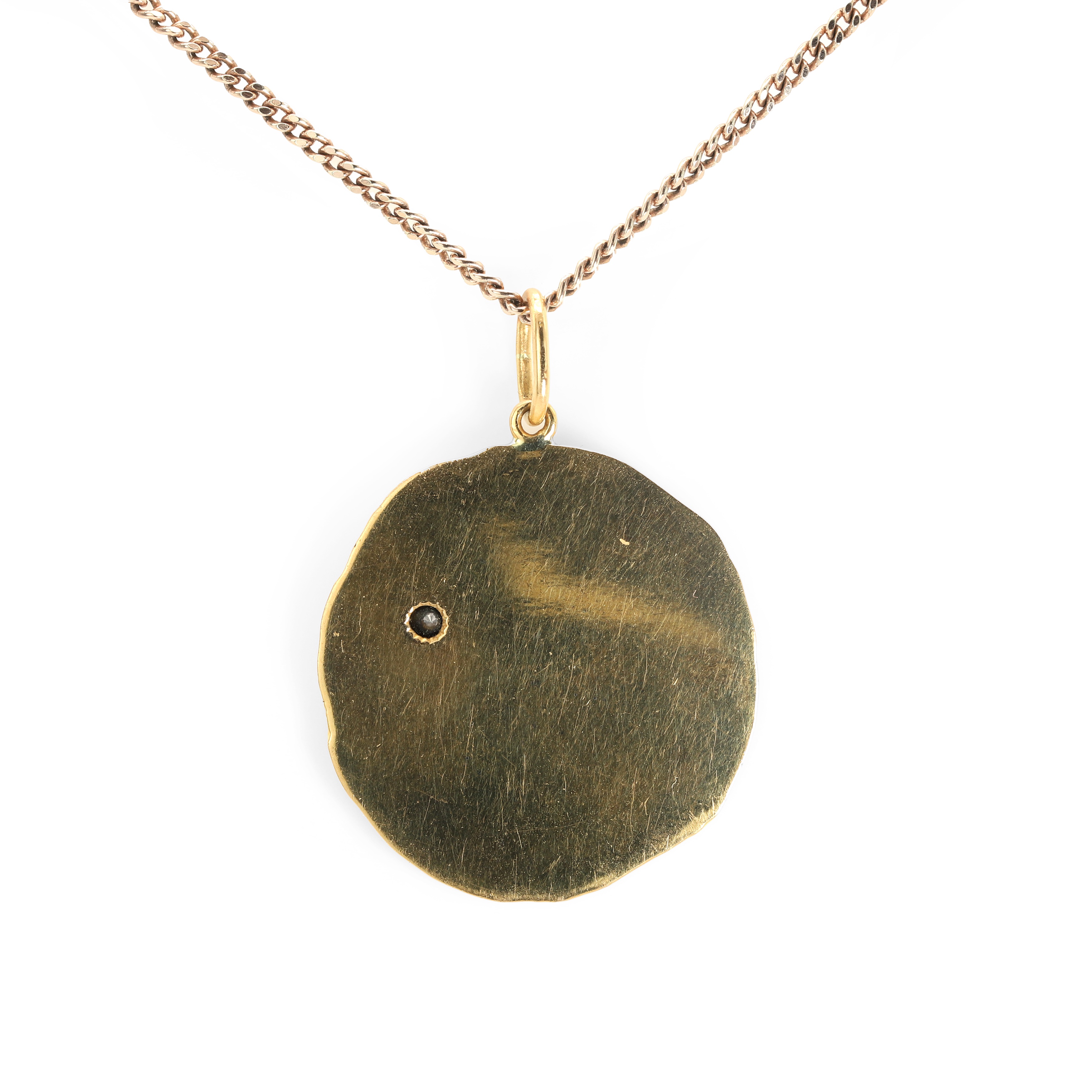 Lot 164 - An abstract design pendant,