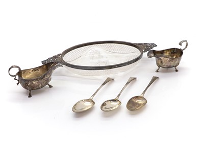 Lot 19 - Three Georgian silver Old English pattern tablespoons