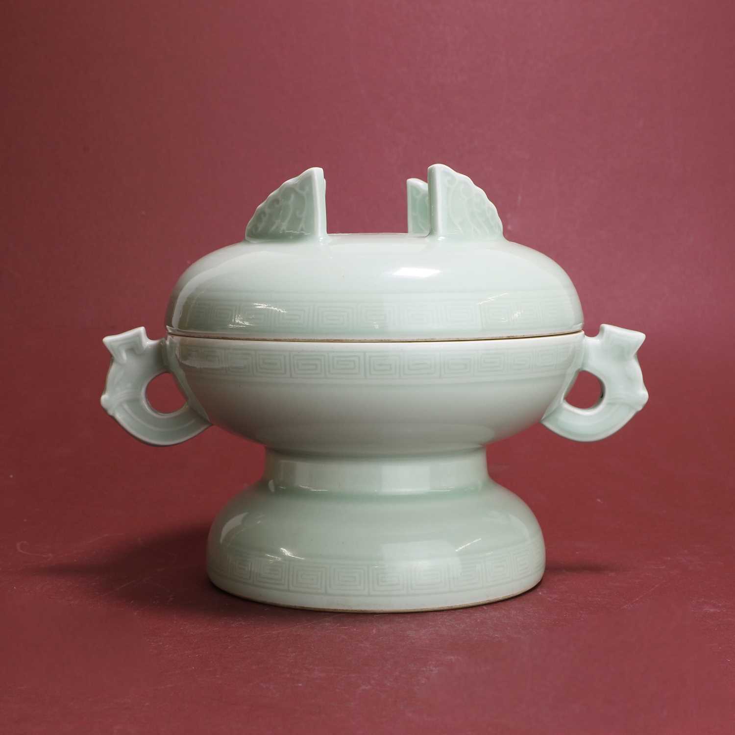 Lot 37 - A Chinese celadon-glazed dou and cover