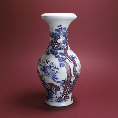 Lot 90 - A Chinese copper-red and underglaze blue vase
