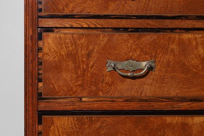 Lot 242 - A brown oak and coromandel chest of drawers