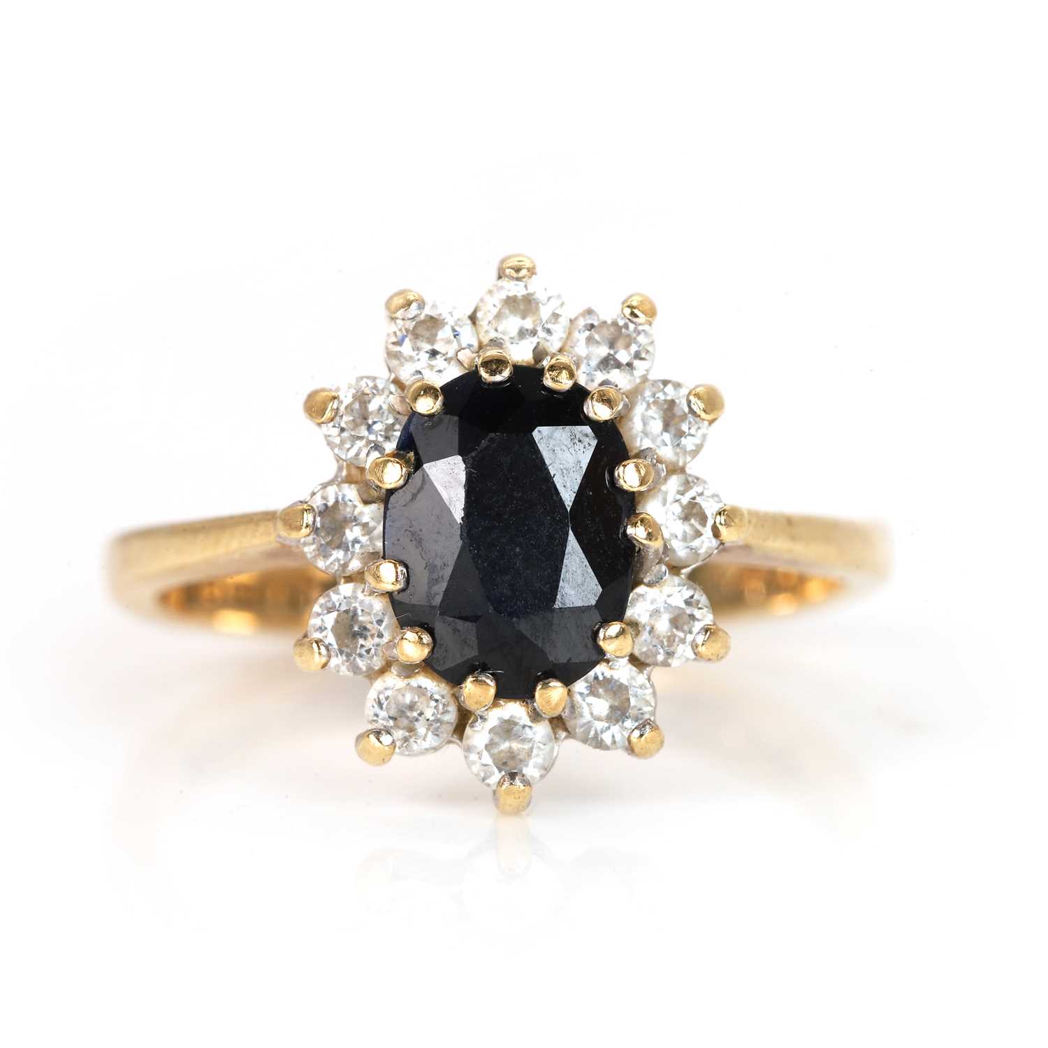 Lot 76 - A 9ct gold sapphire cluster ring
