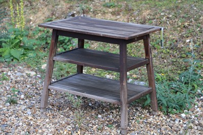 Lot 476 - A Castles' three-tier teak table