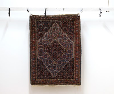 Lot 313 - A Persian Hamadan carpet